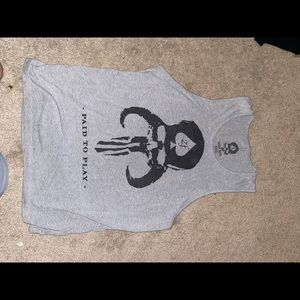 Grey tank top with skull design.